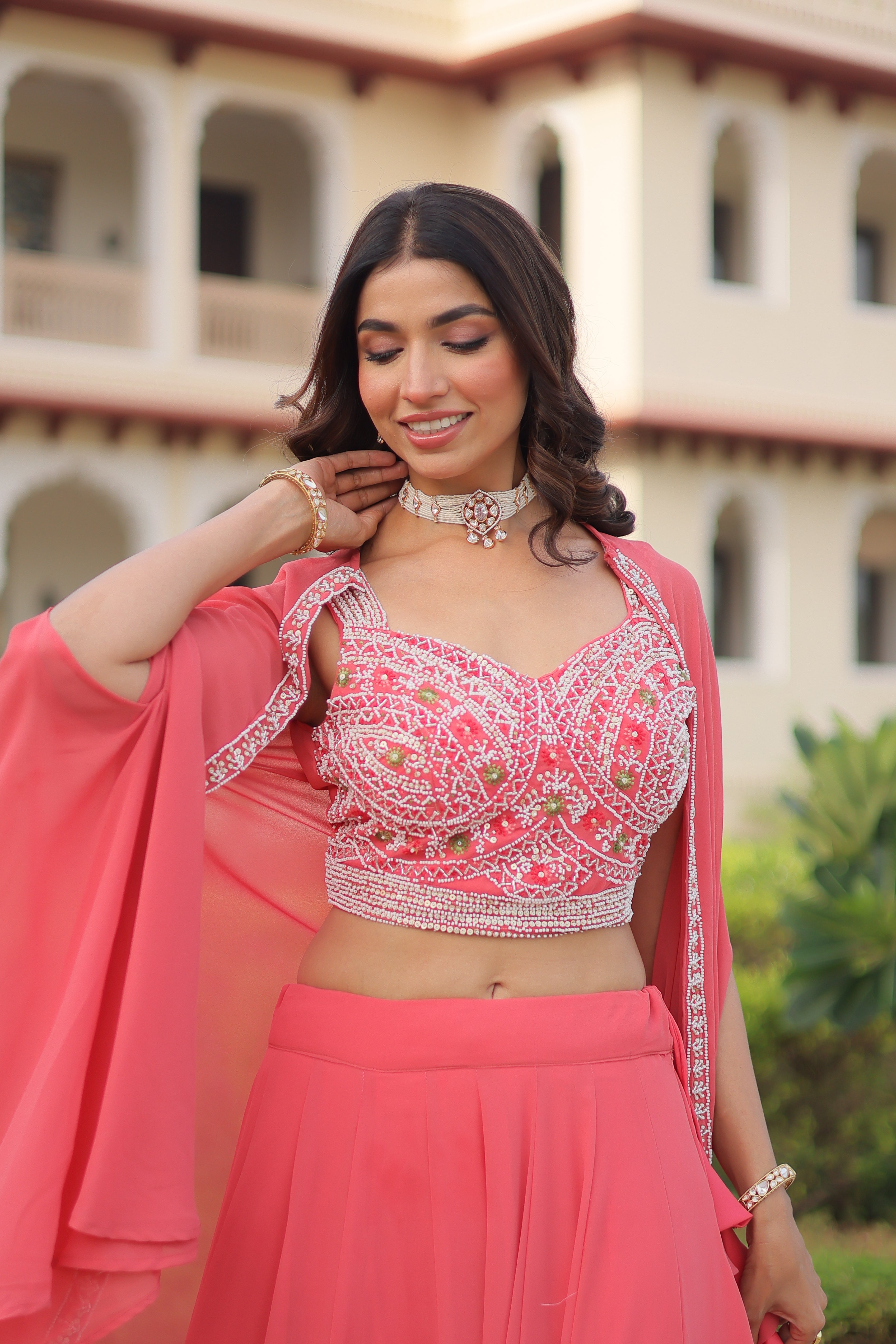 Sanika peach faux georgette lehenga choli with beads embroidery and shrug