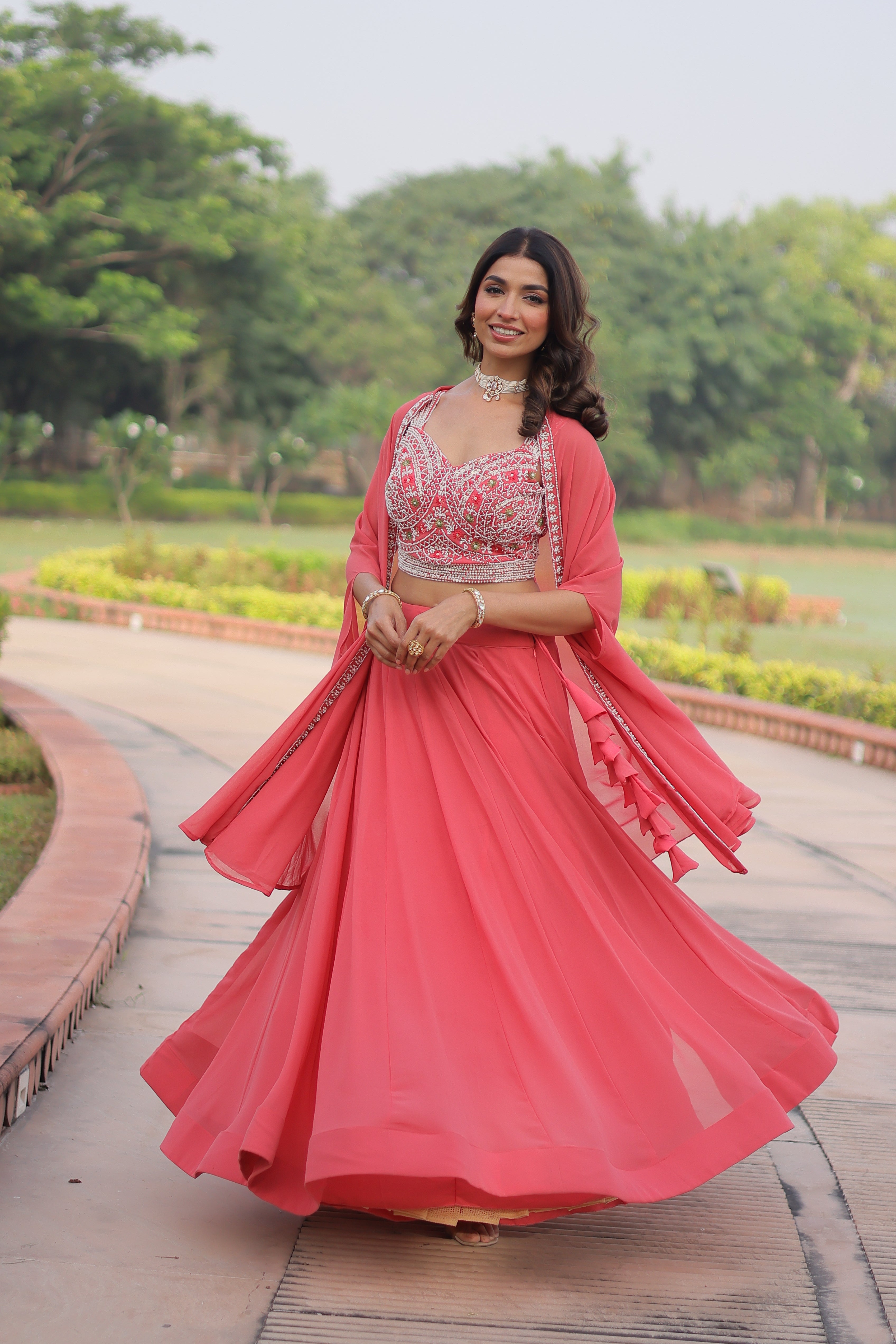 Sanika peach faux georgette lehenga choli with beads embroidery and shrug