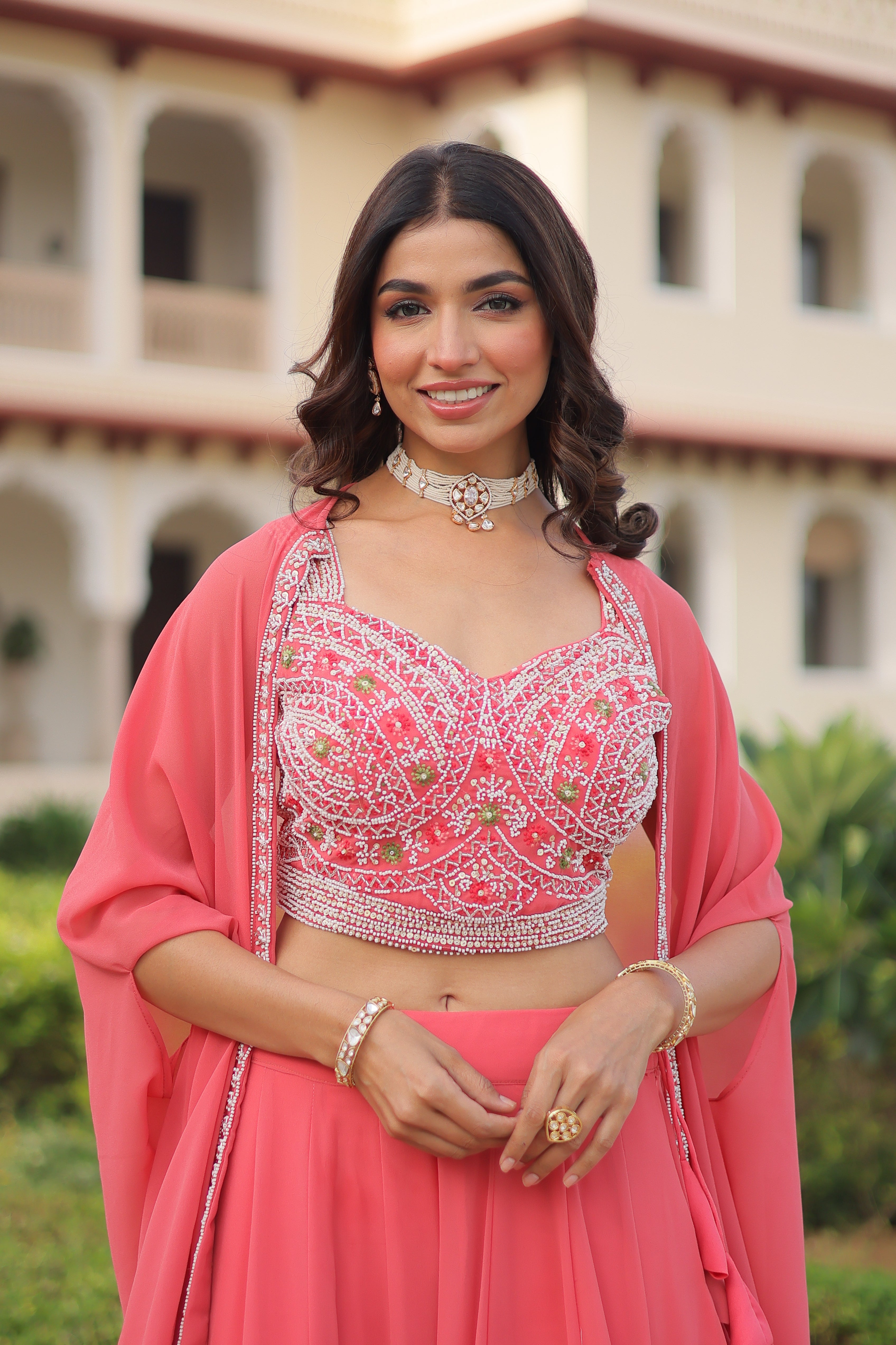 Sanika peach faux georgette lehenga choli with beads embroidery and shrug