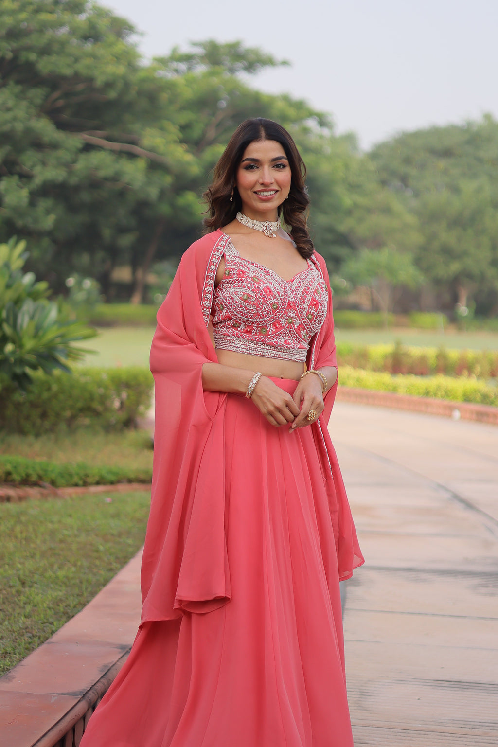 Sanika peach faux georgette lehenga choli with beads embroidery and shrug