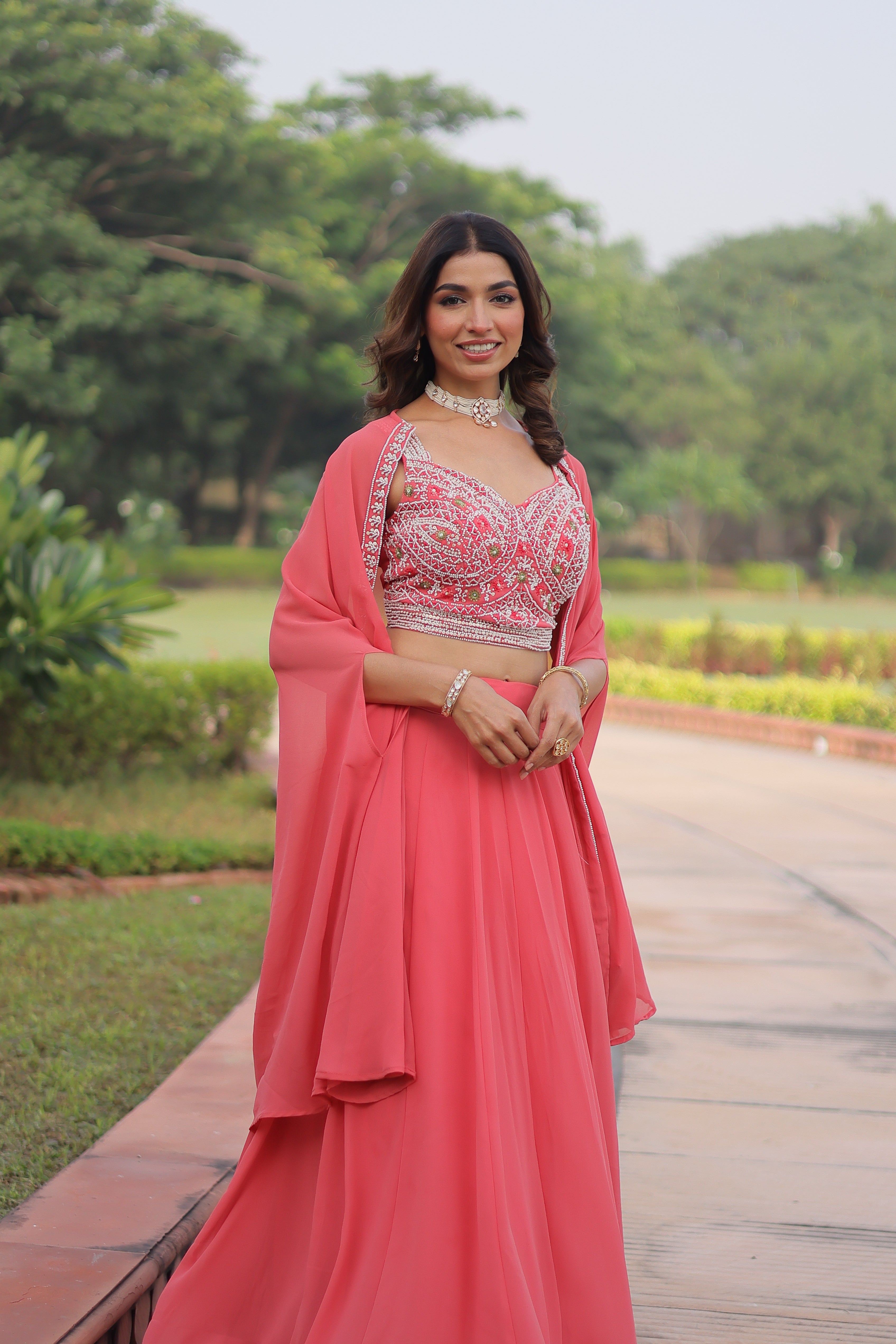 Sanika peach faux georgette lehenga choli with beads embroidery and shrug