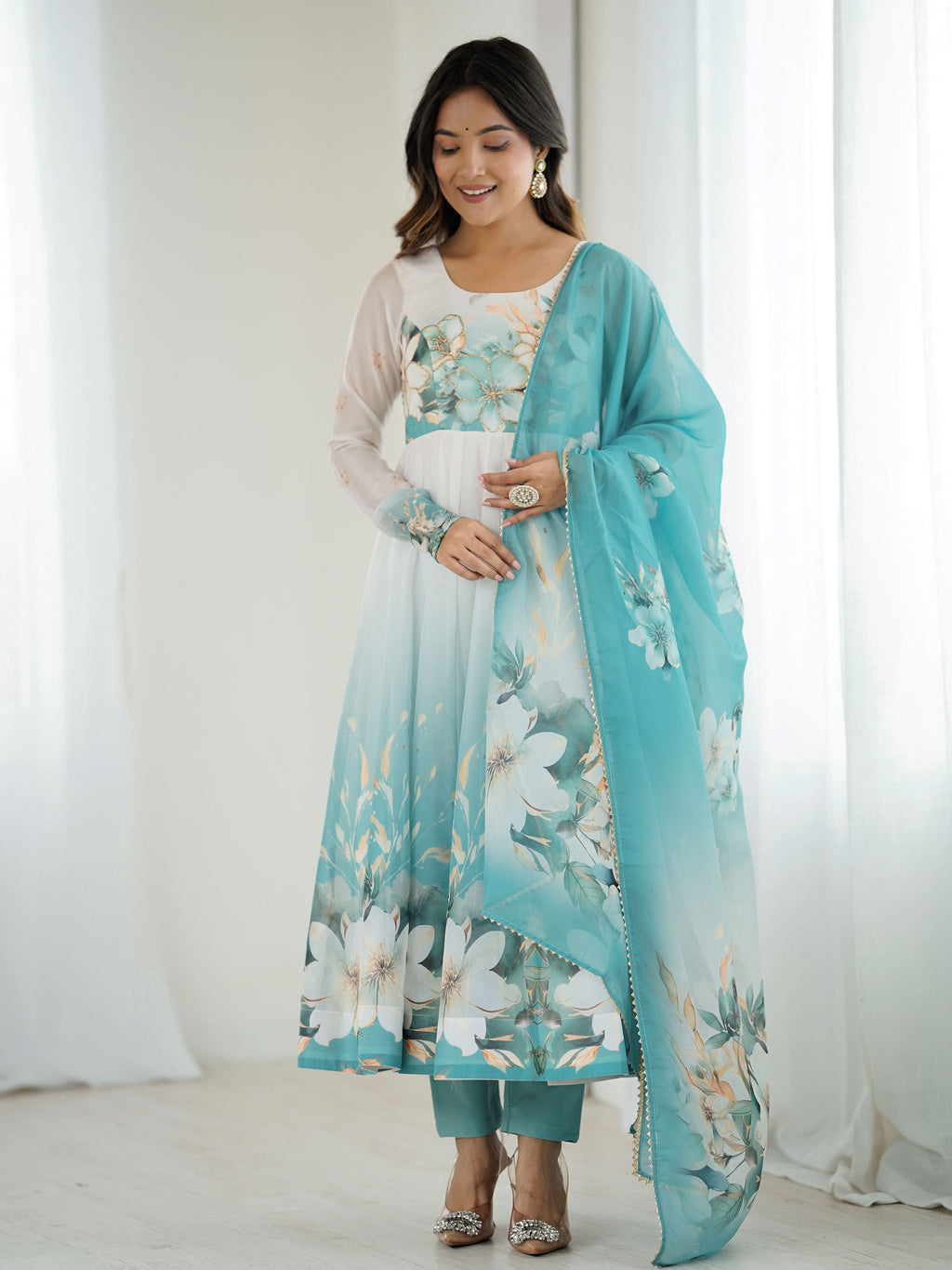 Sky blue organza silk Anarkali suit with floral design