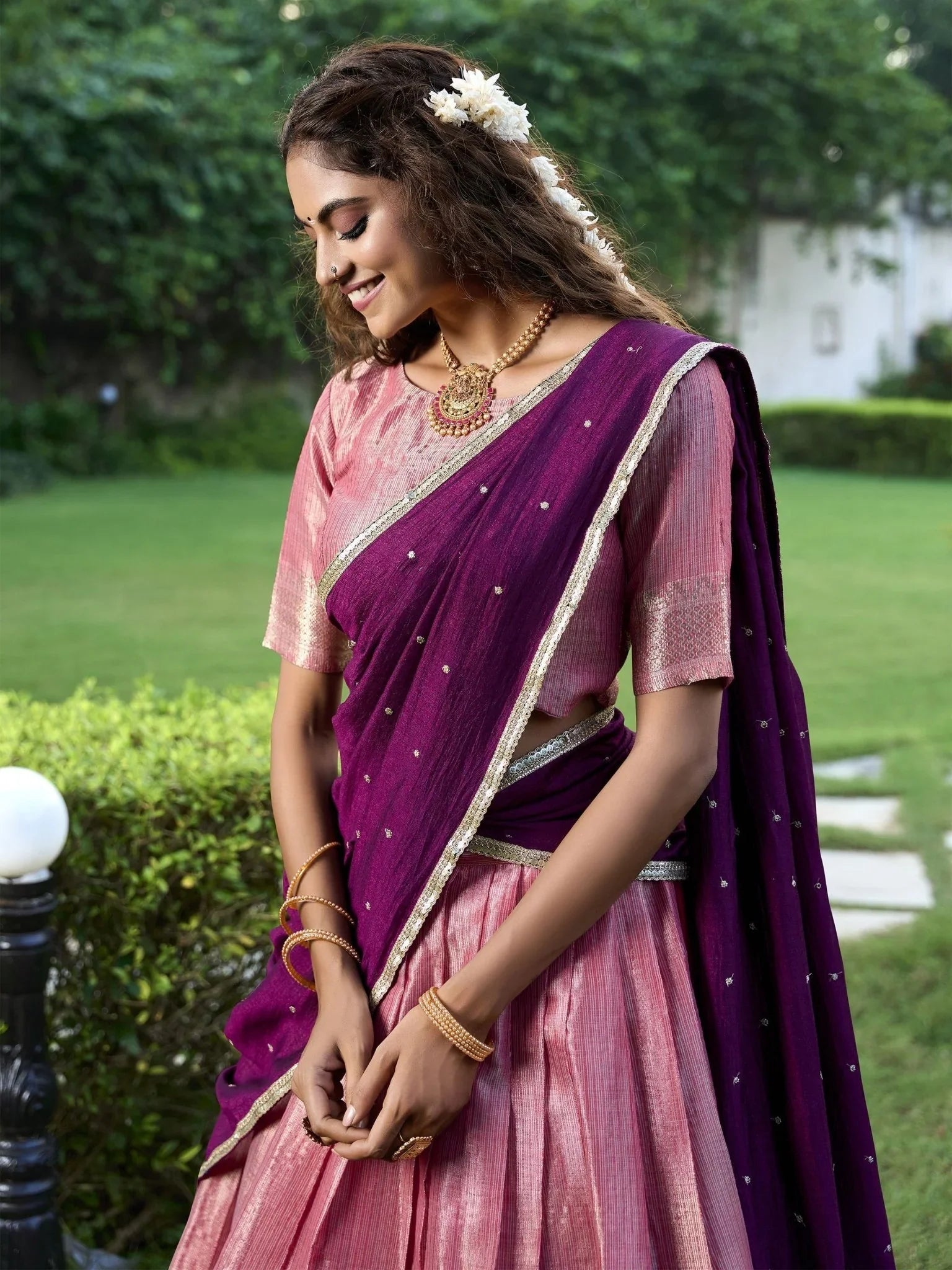 Pink kanchipuram silk lehenga choli with zari weaving and sequins embroidery