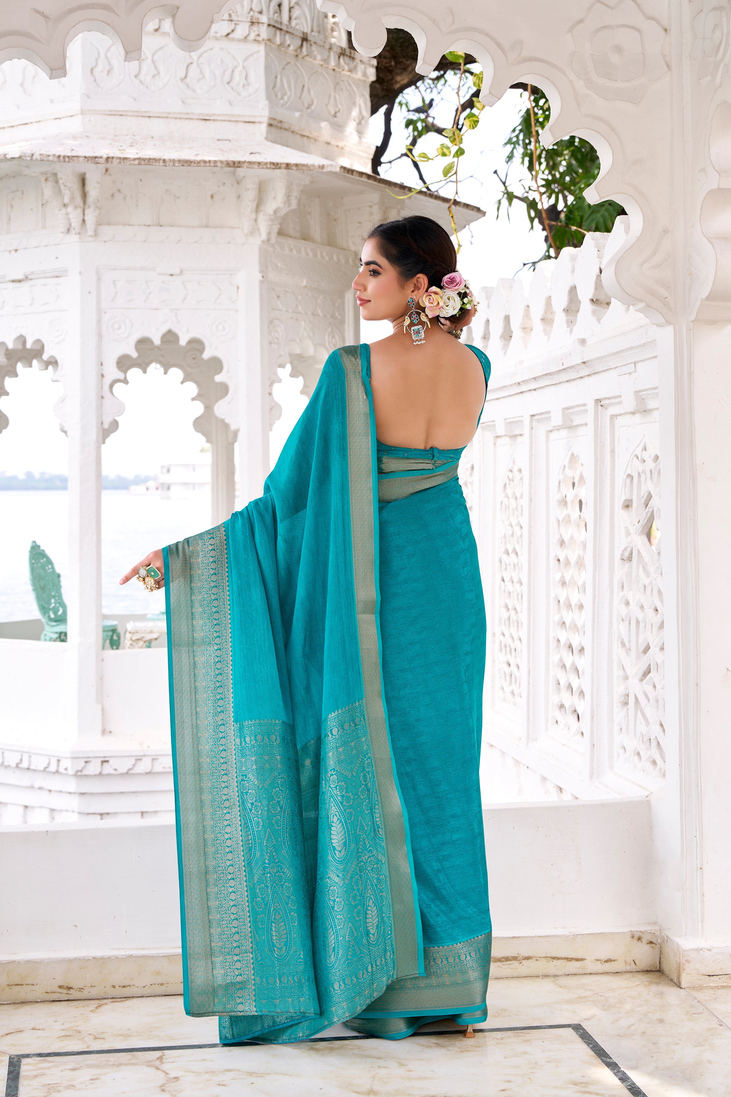 Teal blue chinon self-printed zari weaving saree with blouse