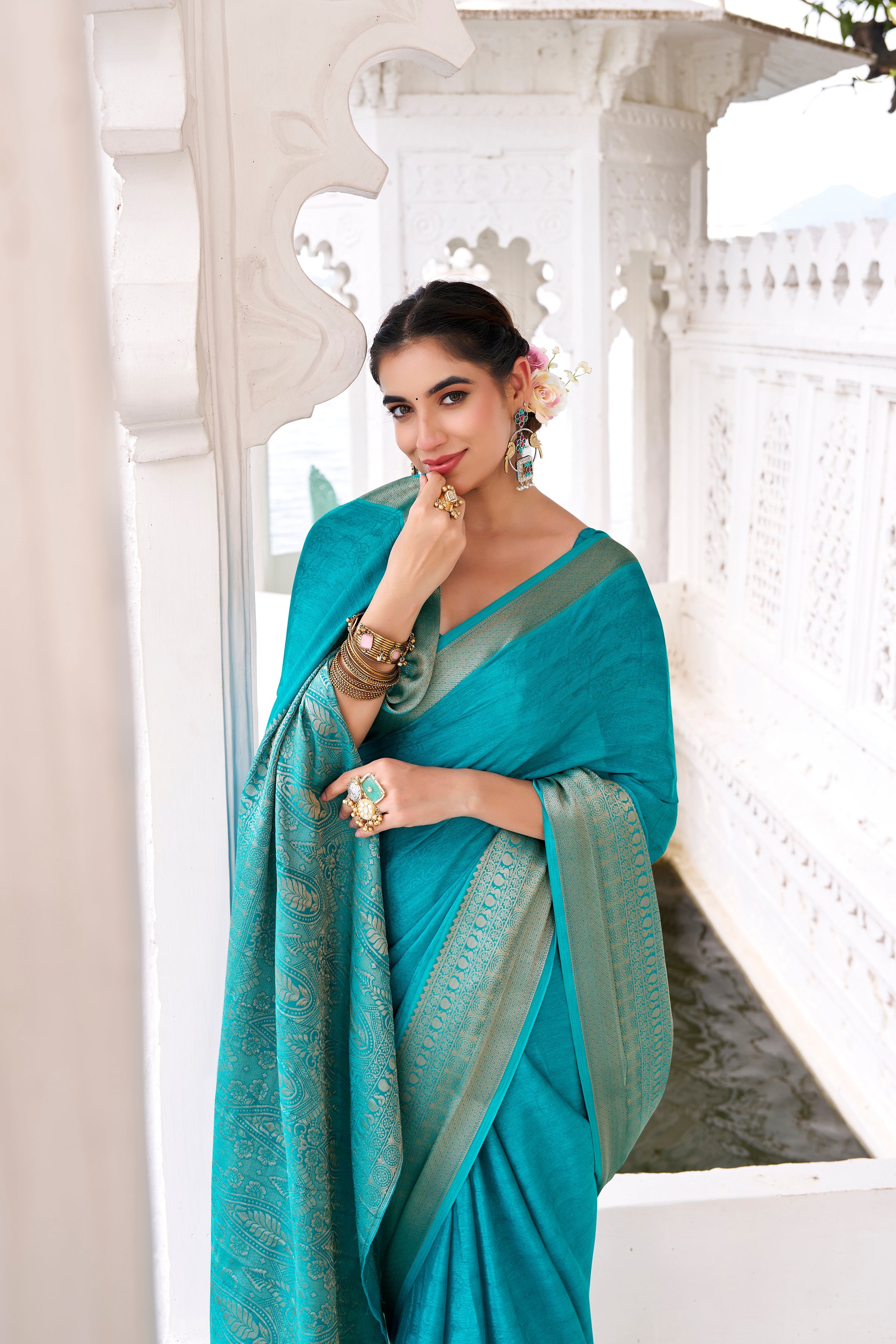 Teal blue chinon self-printed zari weaving saree with blouse