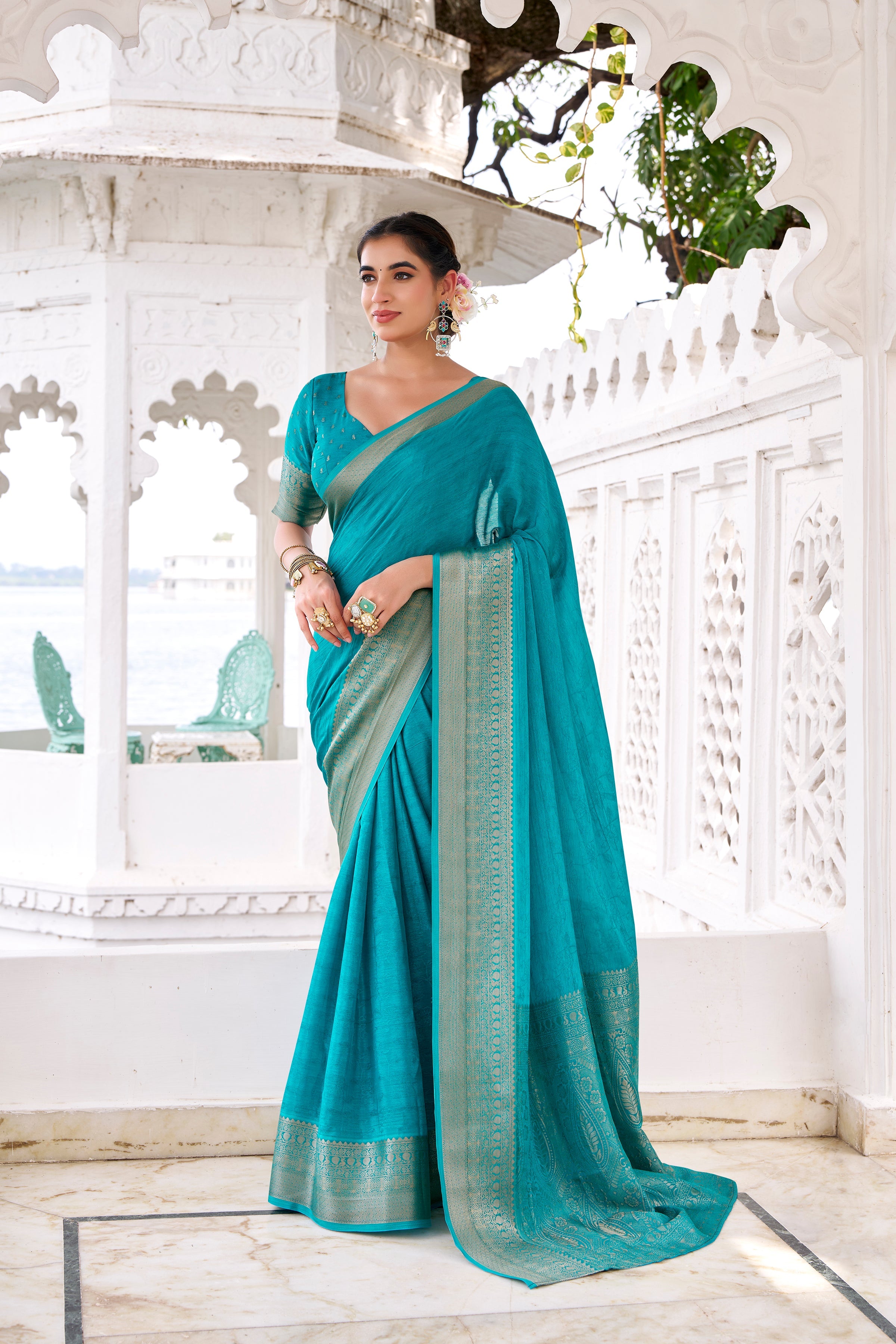 Teal blue chinon self-printed zari weaving saree with blouse