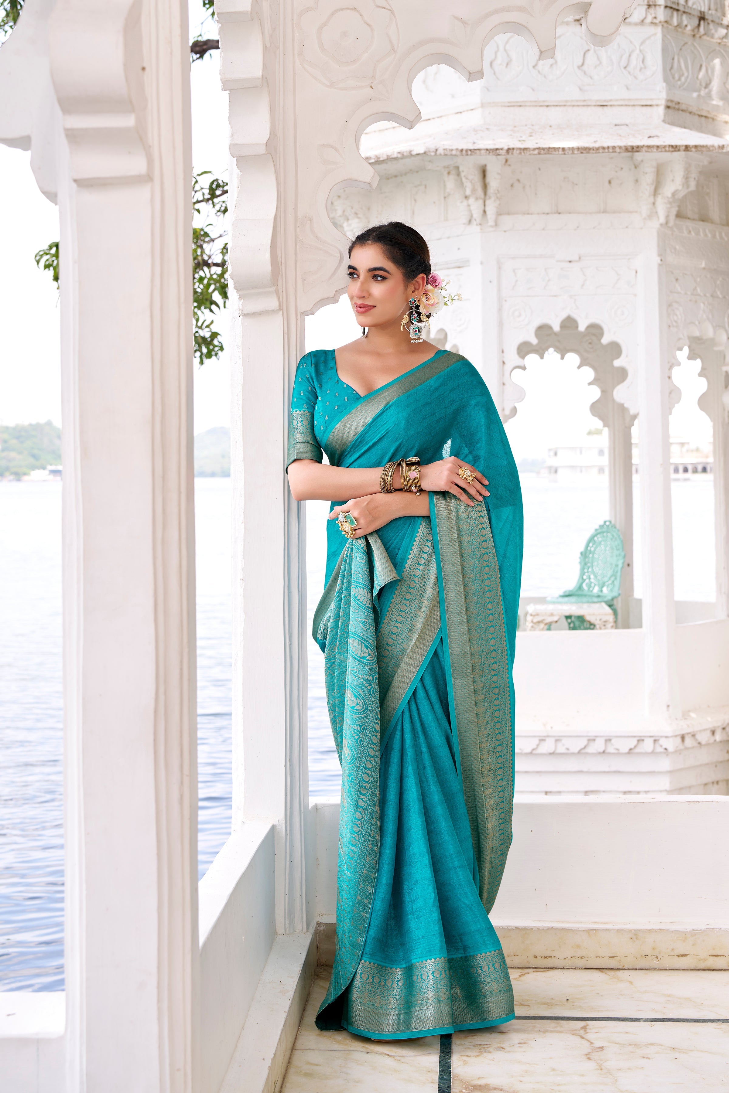 Teal blue chinon self-printed zari weaving saree with blouse