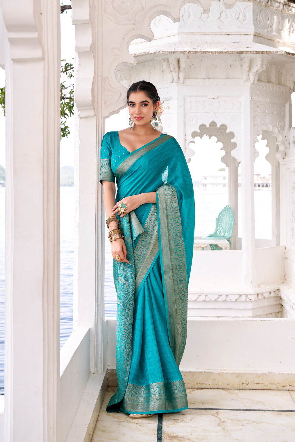 Teal blue chinon self-printed zari weaving saree with blouse