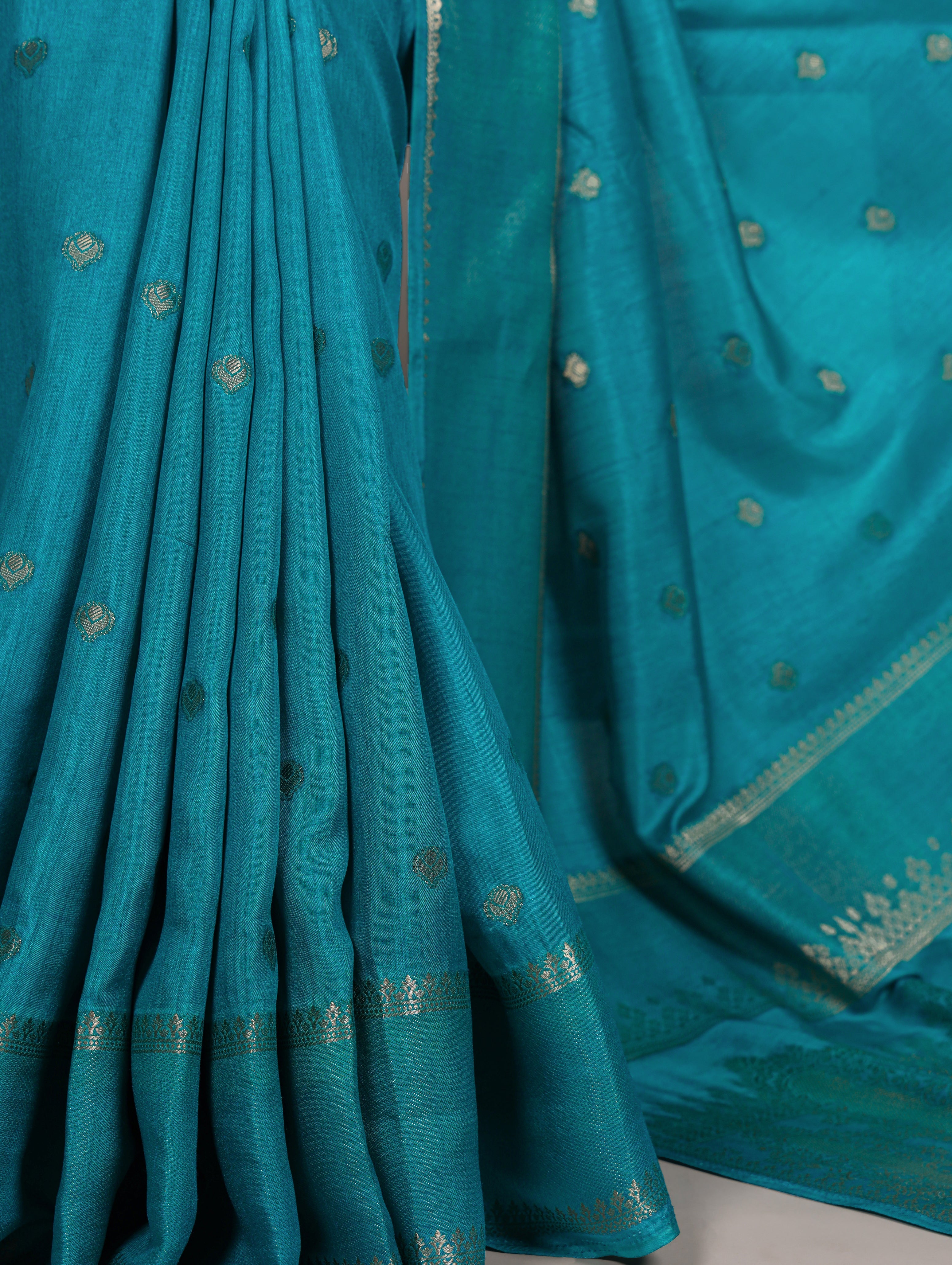Teal blue Roop silk zari weaving saree with unstitched blouse