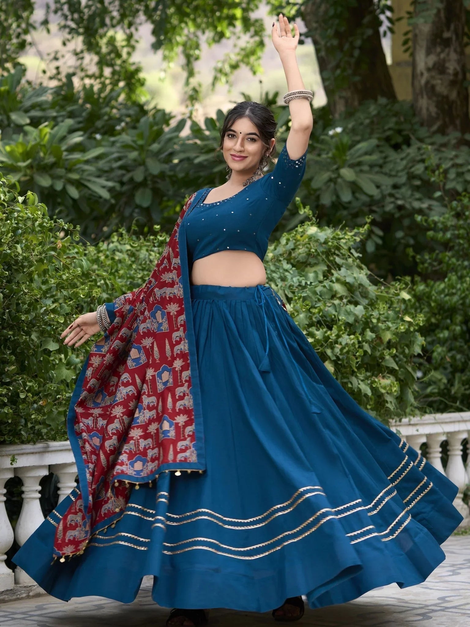 Teal blue pure cotton lehenga choli with coin lace border and purse