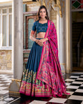 Teal blue silk half saree lehenga with printed design and Foli work