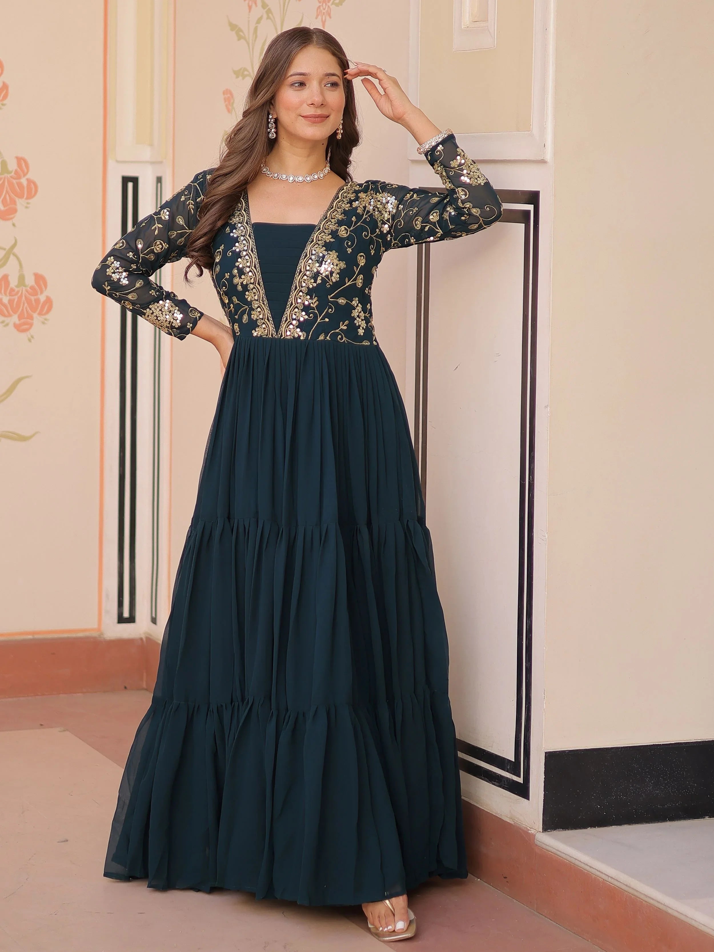 Teal green faux blooming embroidered sequins zari work gown