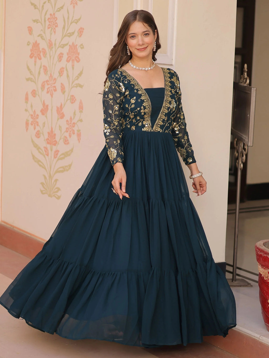 Teal green faux blooming embroidered sequins zari work gown