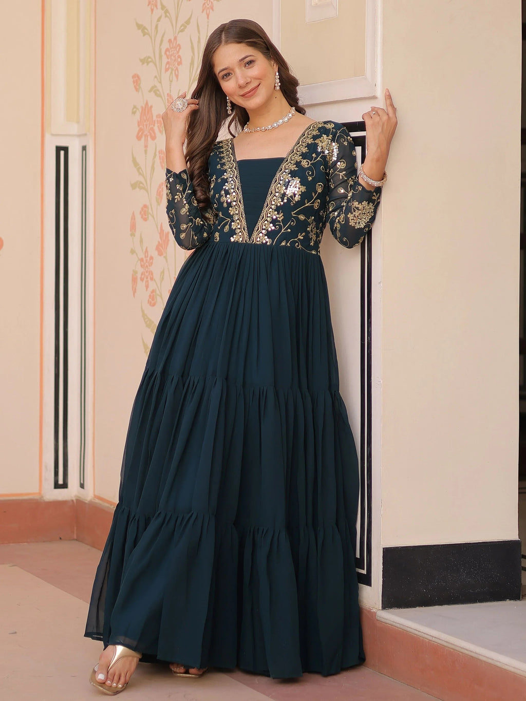 Teal green faux blooming embroidered sequins zari work gown