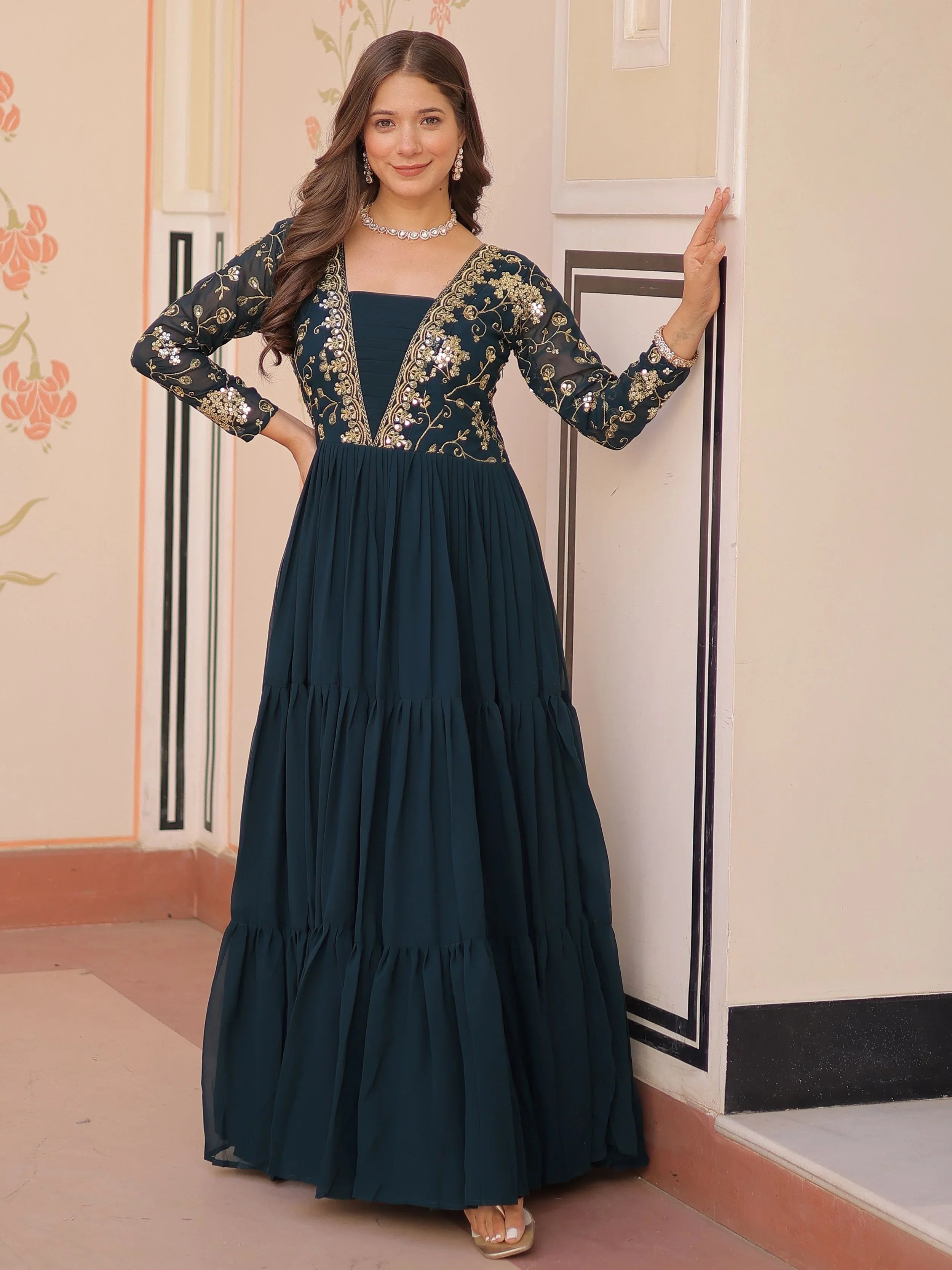 Teal green faux blooming embroidered sequins zari work gown