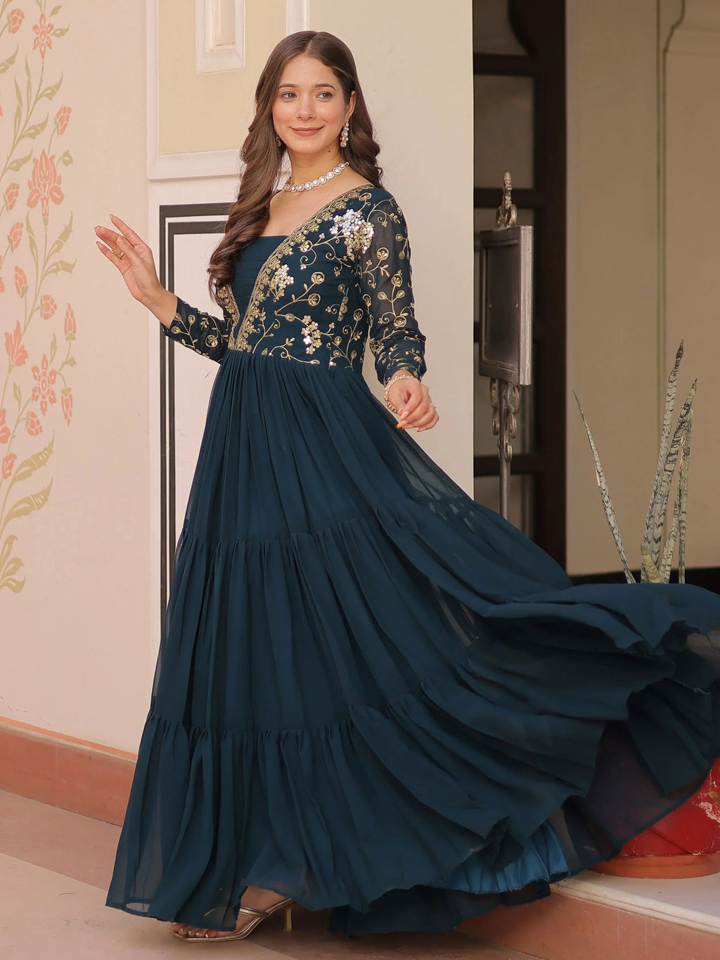 Teal green faux blooming embroidered sequins zari work gown