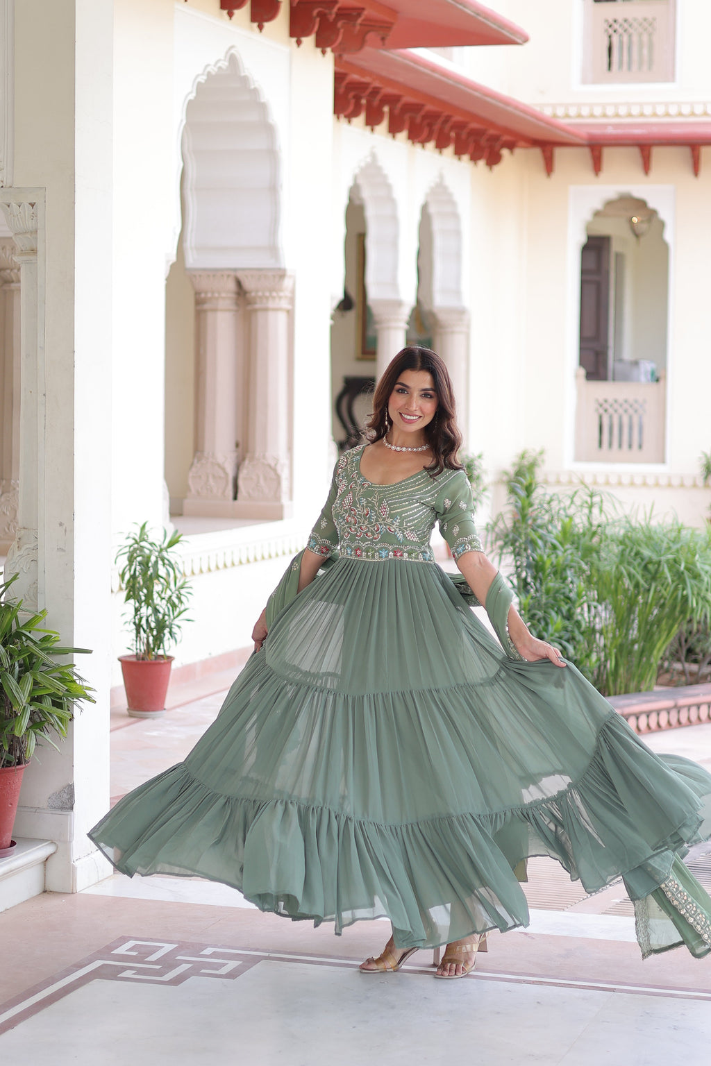 Tosi pista green faux blooming gown with sequins embroidered work and dupatta