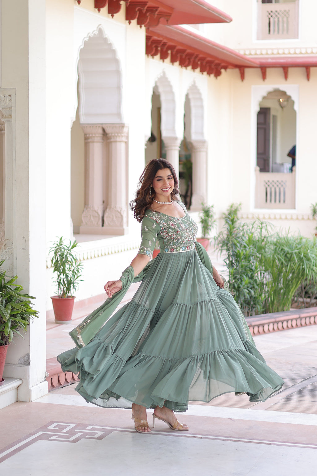 Tosi pista green faux blooming gown with sequins embroidered work and dupatta