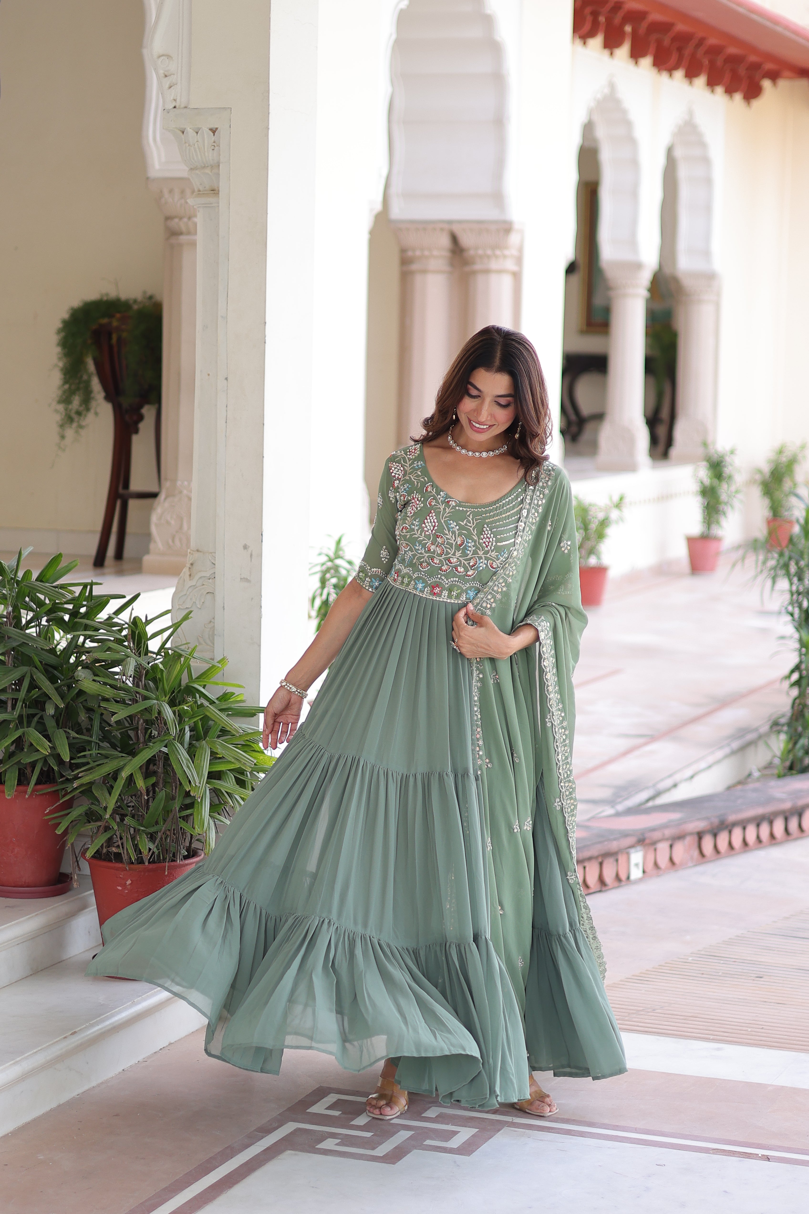 Tosi pista green faux blooming gown with sequins embroidered work and dupatta
