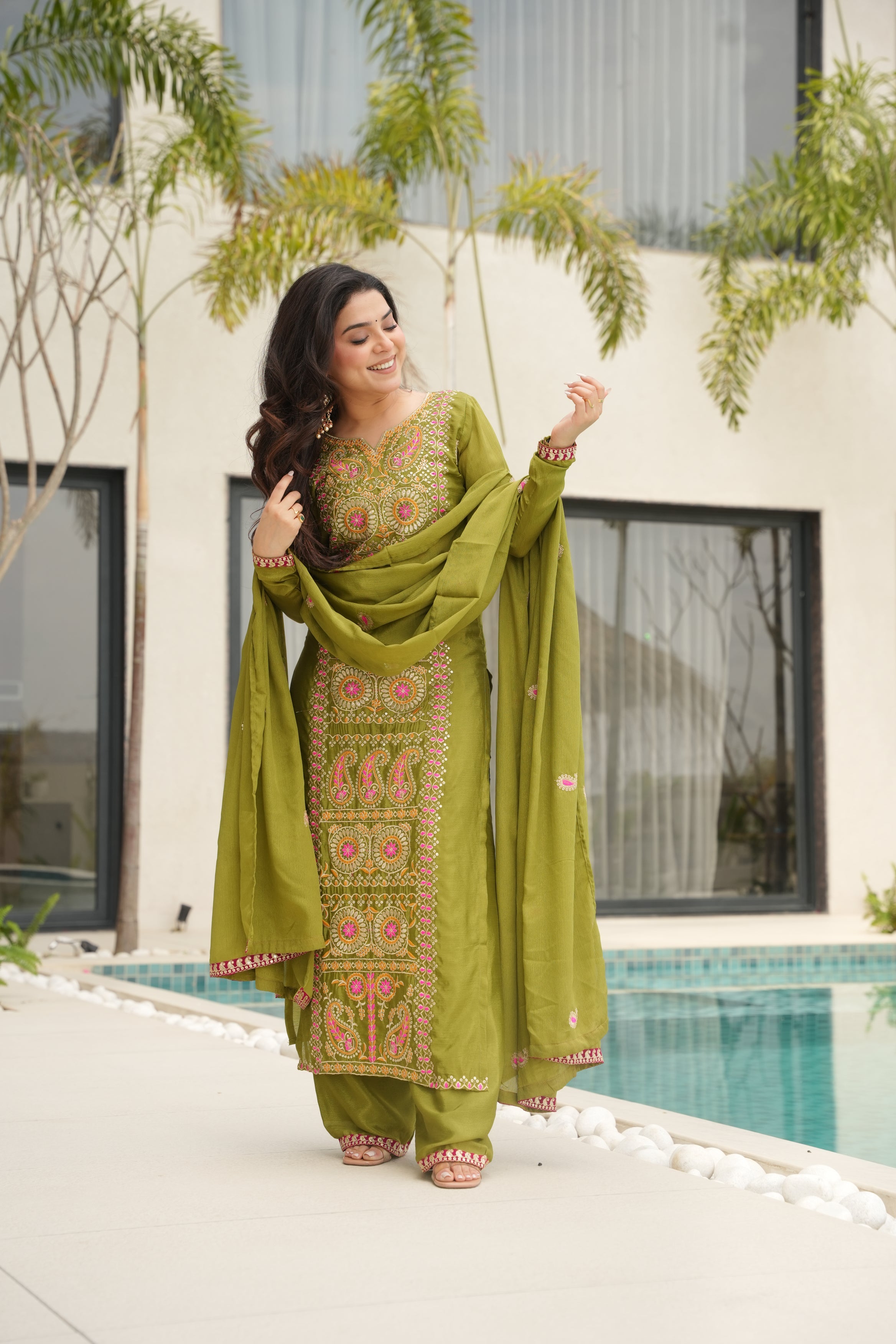 Varsha parrot green Chinnon kurti set with zari multi thread embroidery work
