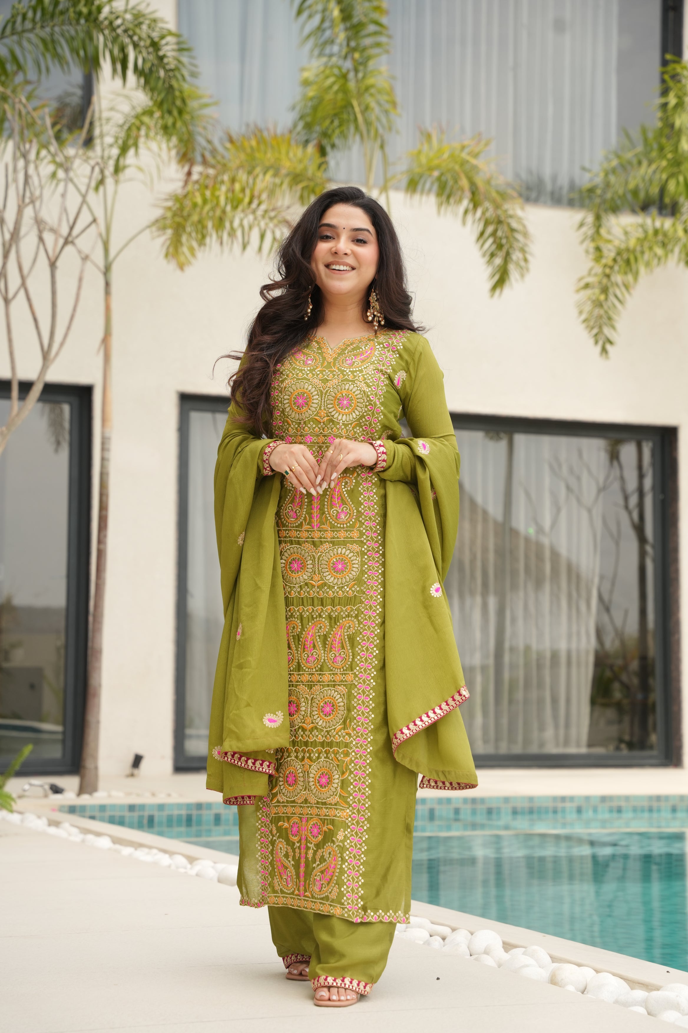 Varsha parrot green Chinnon kurti set with zari multi thread embroidery work