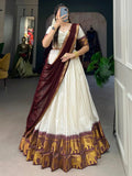 White traditional half-saree lehenga with chex pattern and zari work