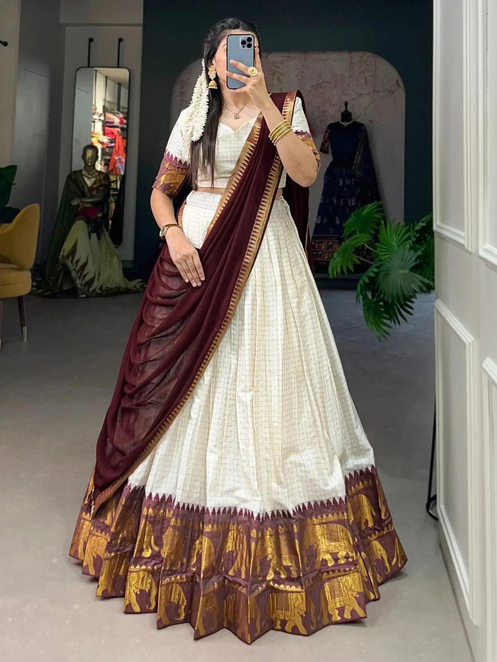White traditional half-saree lehenga with chex pattern and zari work