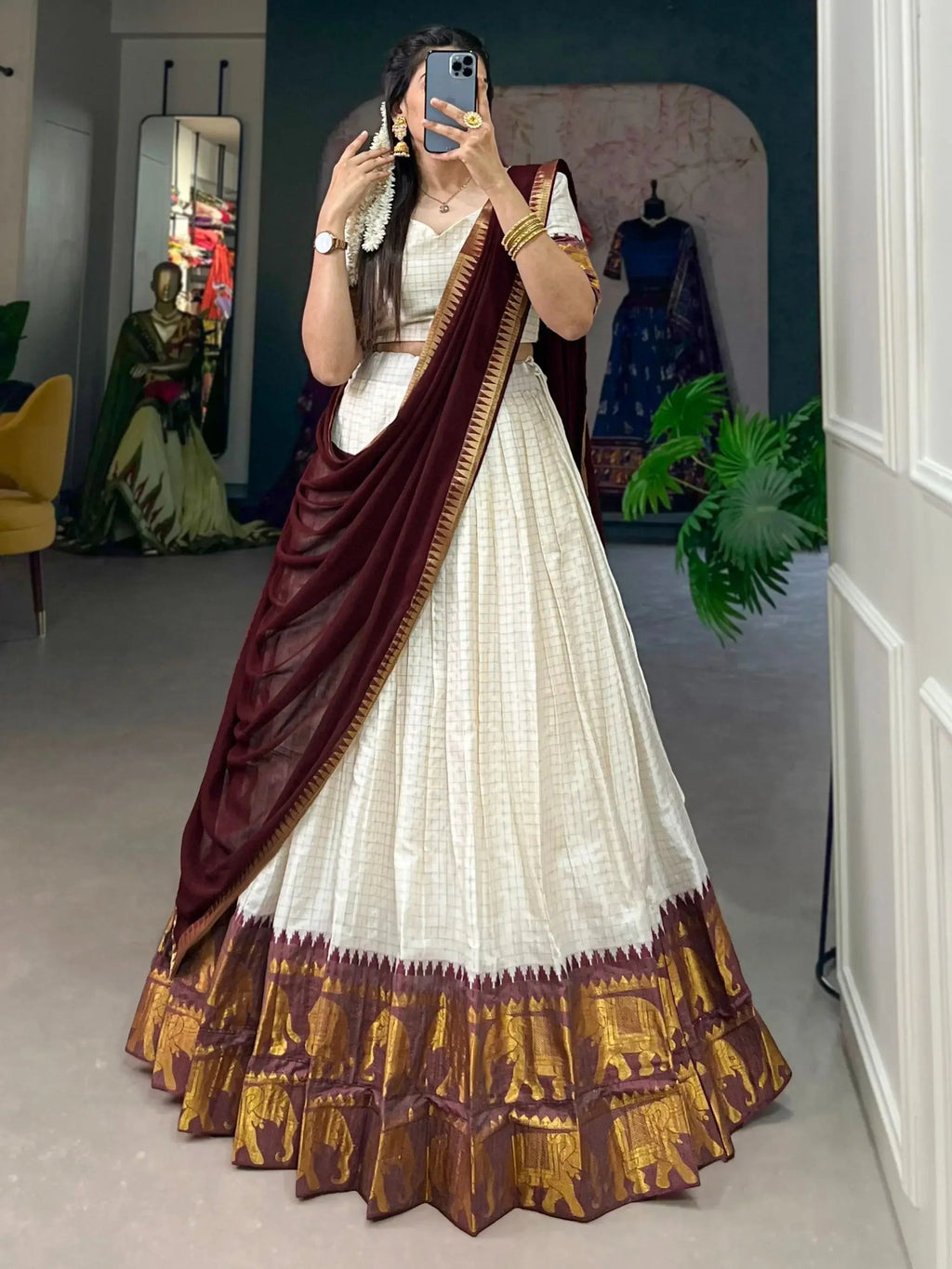 White traditional half-saree lehenga with chex pattern and zari work