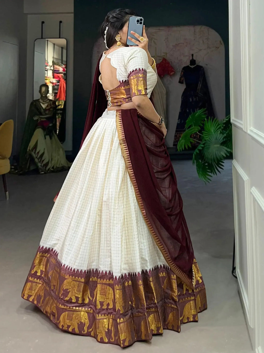 White traditional half-saree lehenga with chex pattern and zari work