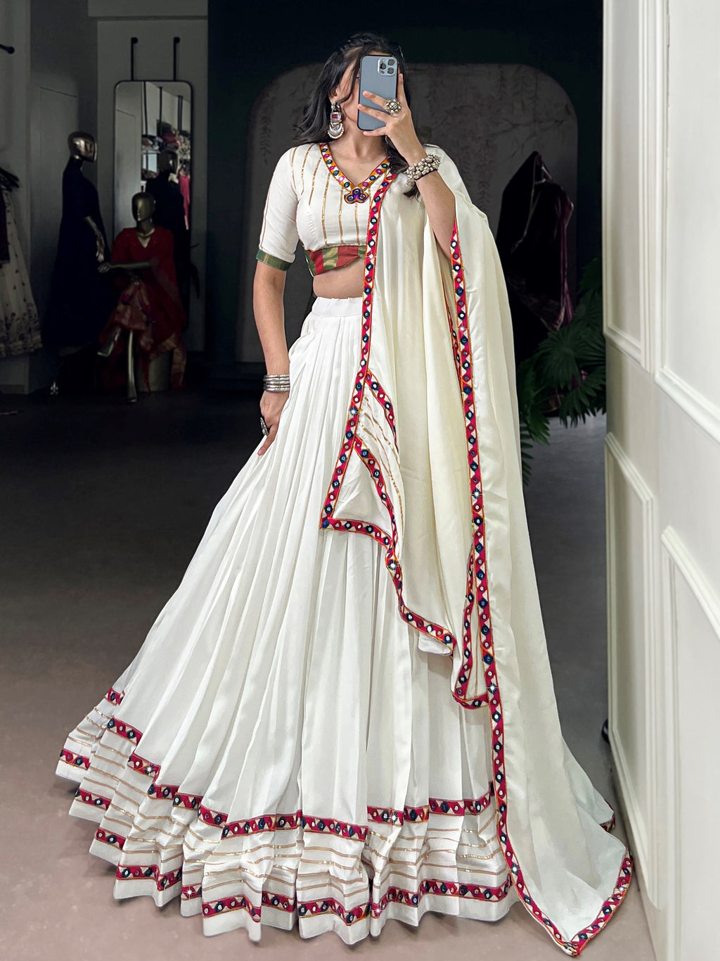 White pure rayon lehenga choli with mirror gamthi and gotta patti work