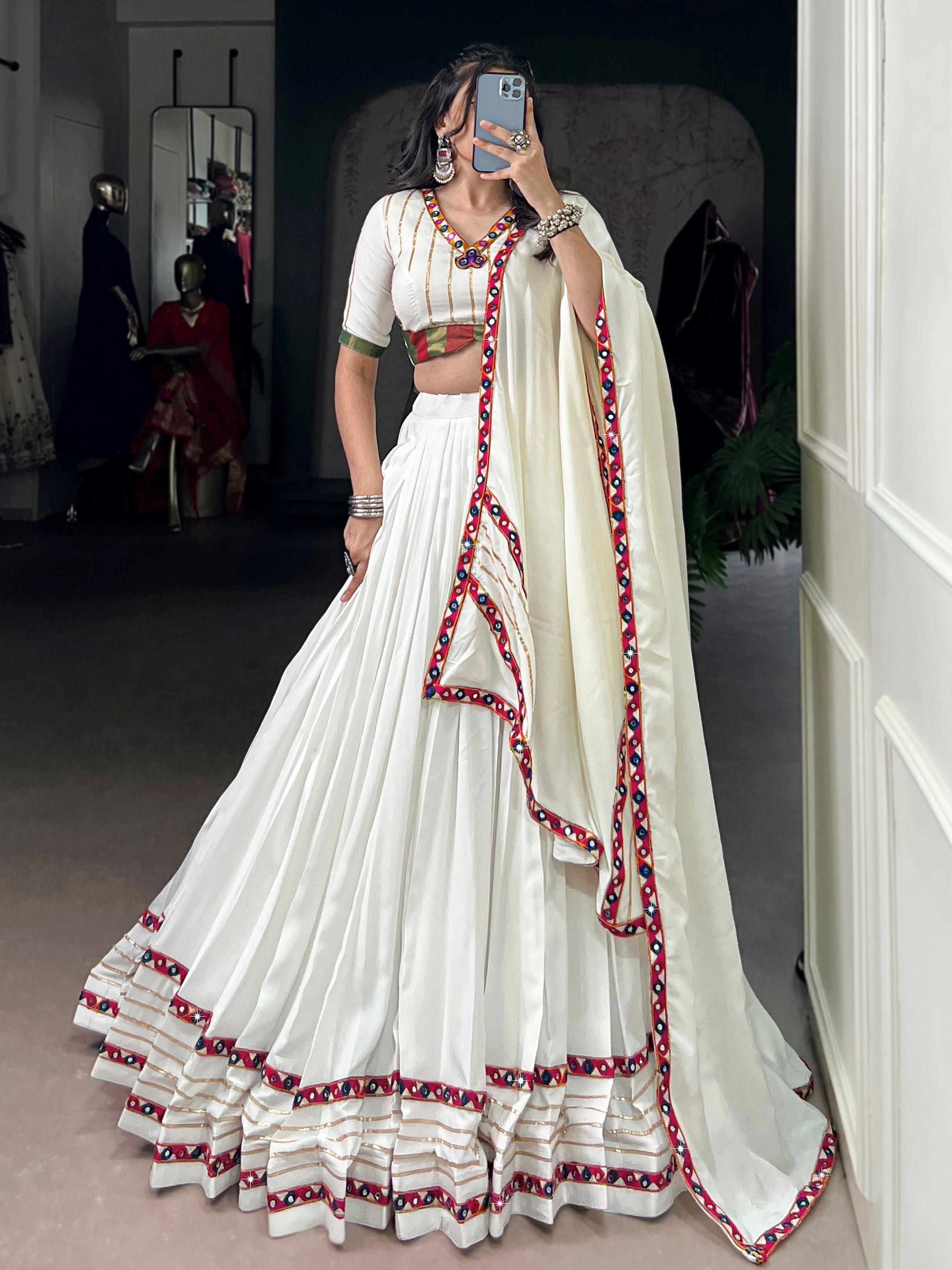White pure rayon lehenga choli with mirror gamthi and gotta patti work