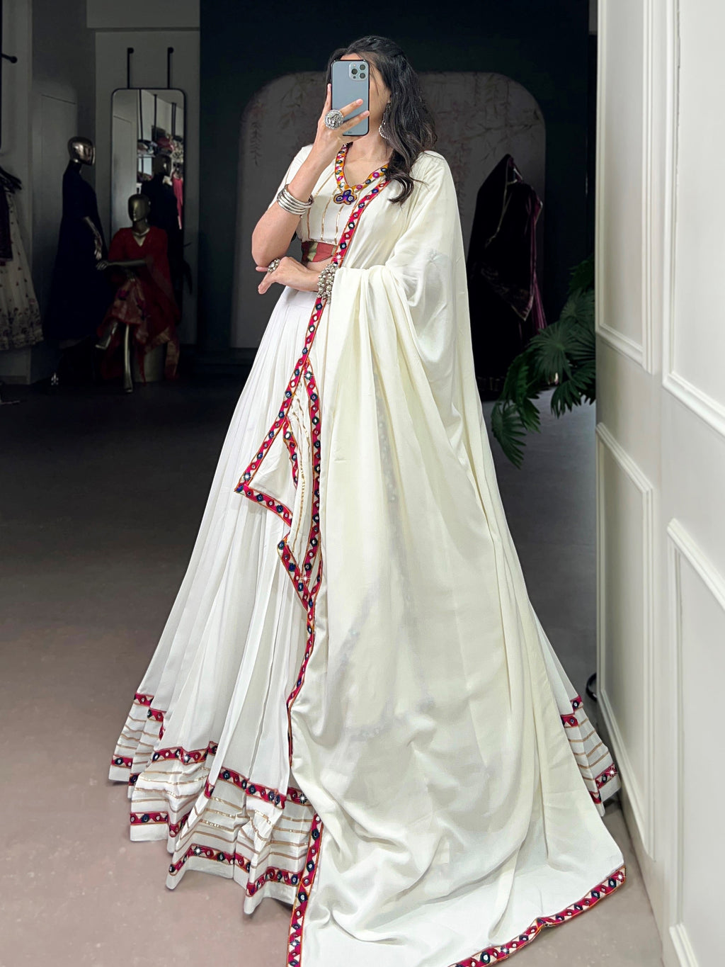 White pure rayon lehenga choli with mirror gamthi and gotta patti work