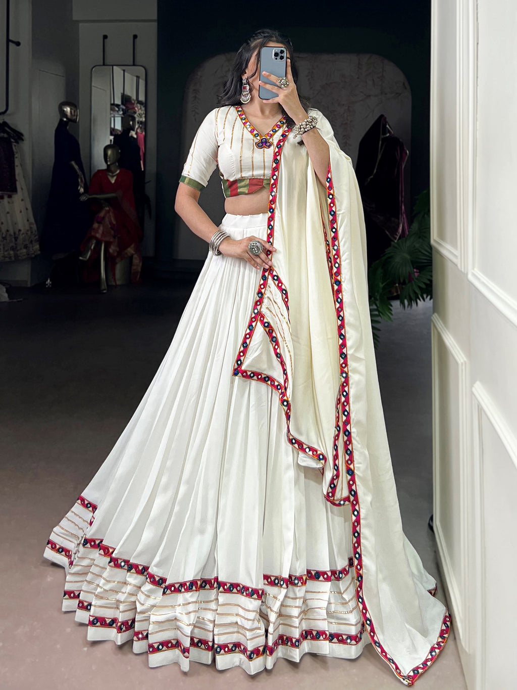 White pure rayon lehenga choli with mirror gamthi and gotta patti work