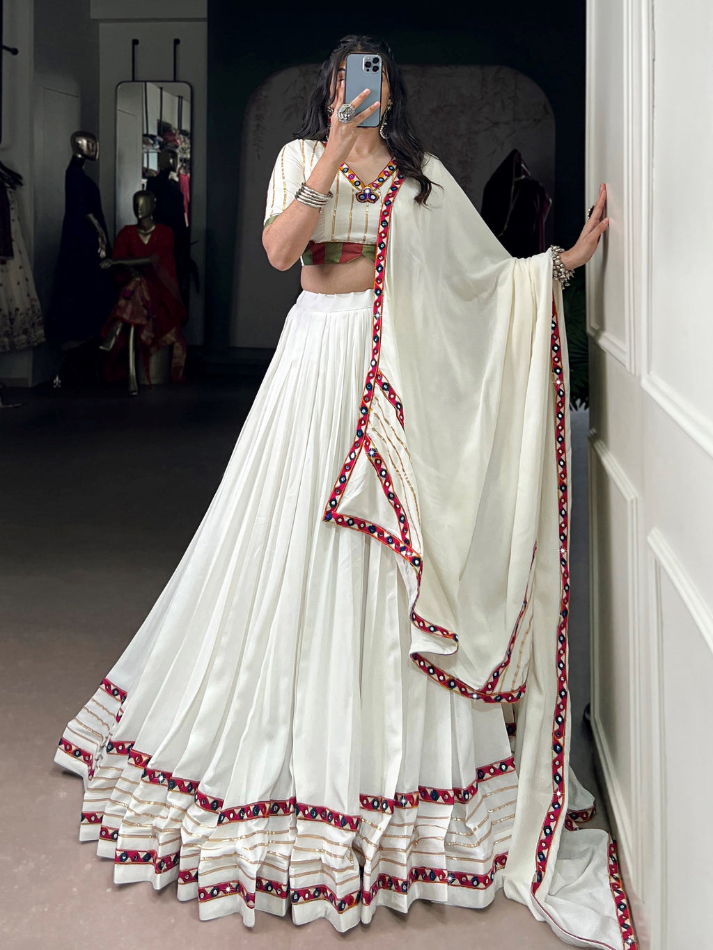 White pure rayon lehenga choli with mirror gamthi and gotta patti work