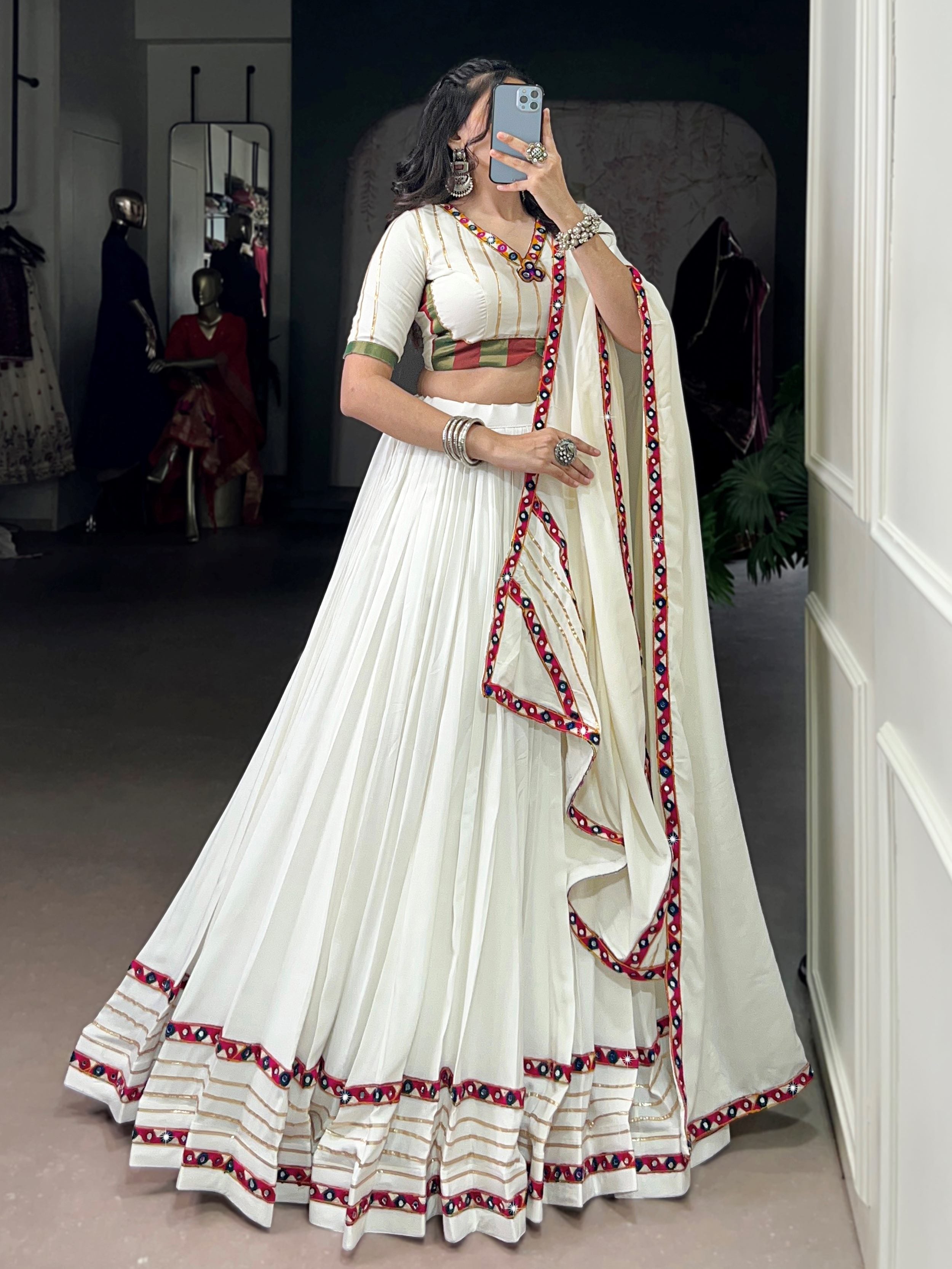 White pure rayon lehenga choli with mirror gamthi and gotta patti work