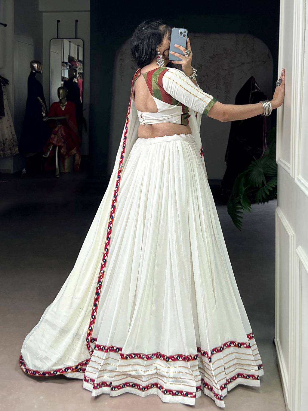 White pure rayon lehenga choli with mirror gamthi and gotta patti work