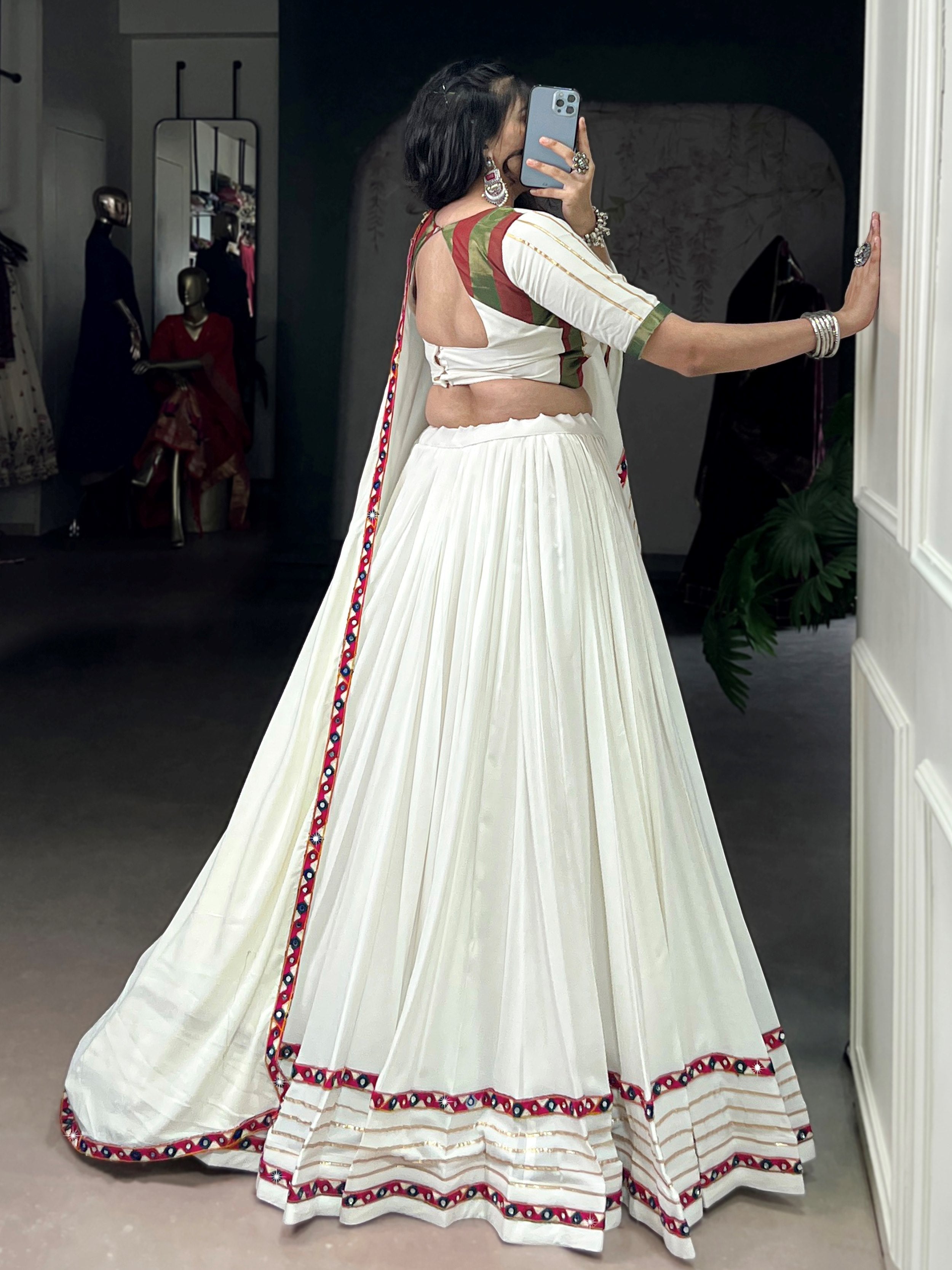 White pure rayon lehenga choli with mirror gamthi and gotta patti work