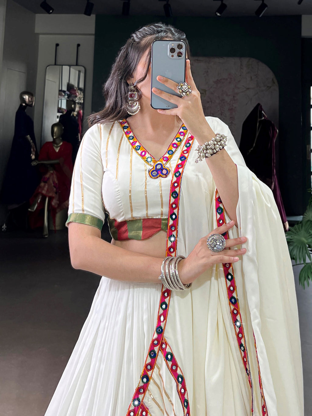 White pure rayon lehenga choli with mirror gamthi and gotta patti work