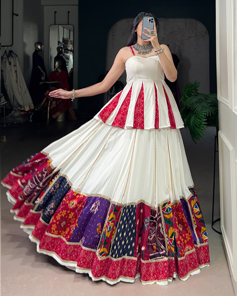 White rayon lehenga choli with Bandhej foil print and patch work