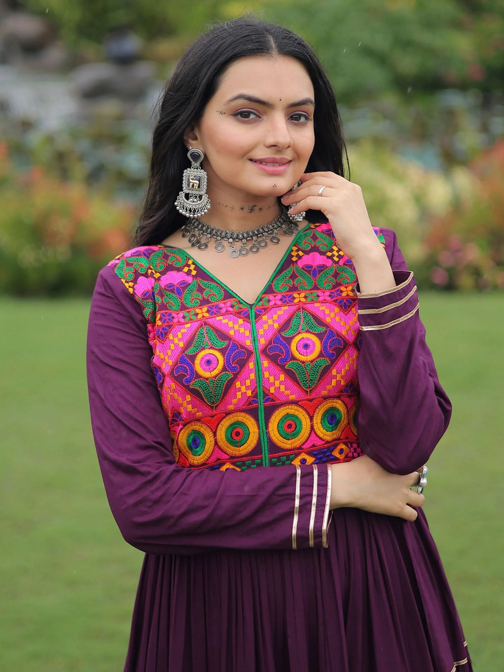 Wine coloured rayon flair gown with kutchi gamthi embroidery and mirror work