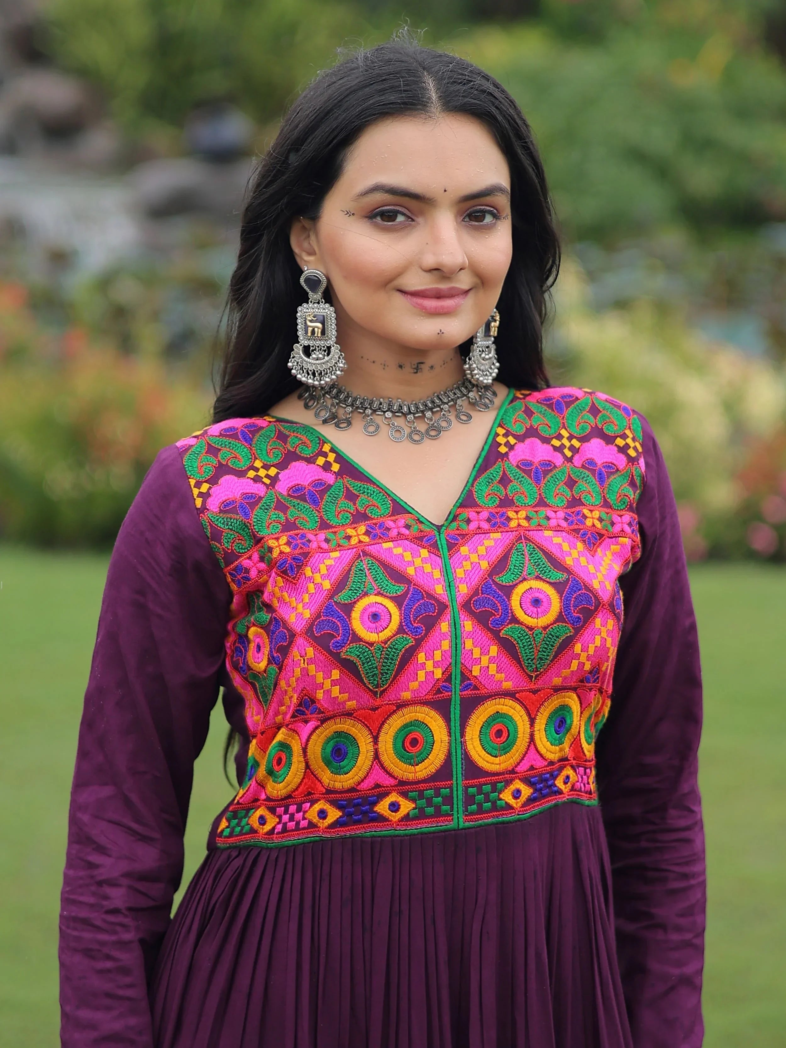 Wine coloured rayon flair gown with kutchi gamthi embroidery and mirror work