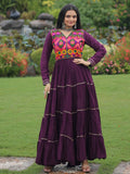 Wine coloured rayon flair gown with kutchi gamthi embroidery and mirror work