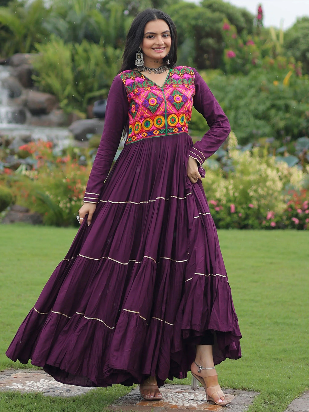Wine coloured rayon flair gown with kutchi gamthi embroidery and mirror work