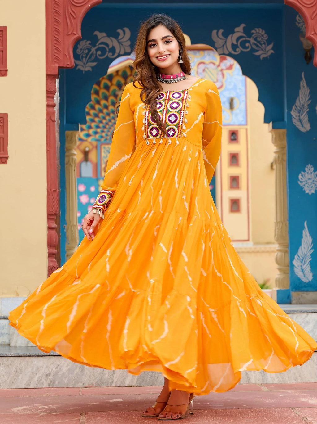 Yellow bandhani print georgette navratri gown with kutchi patchwork