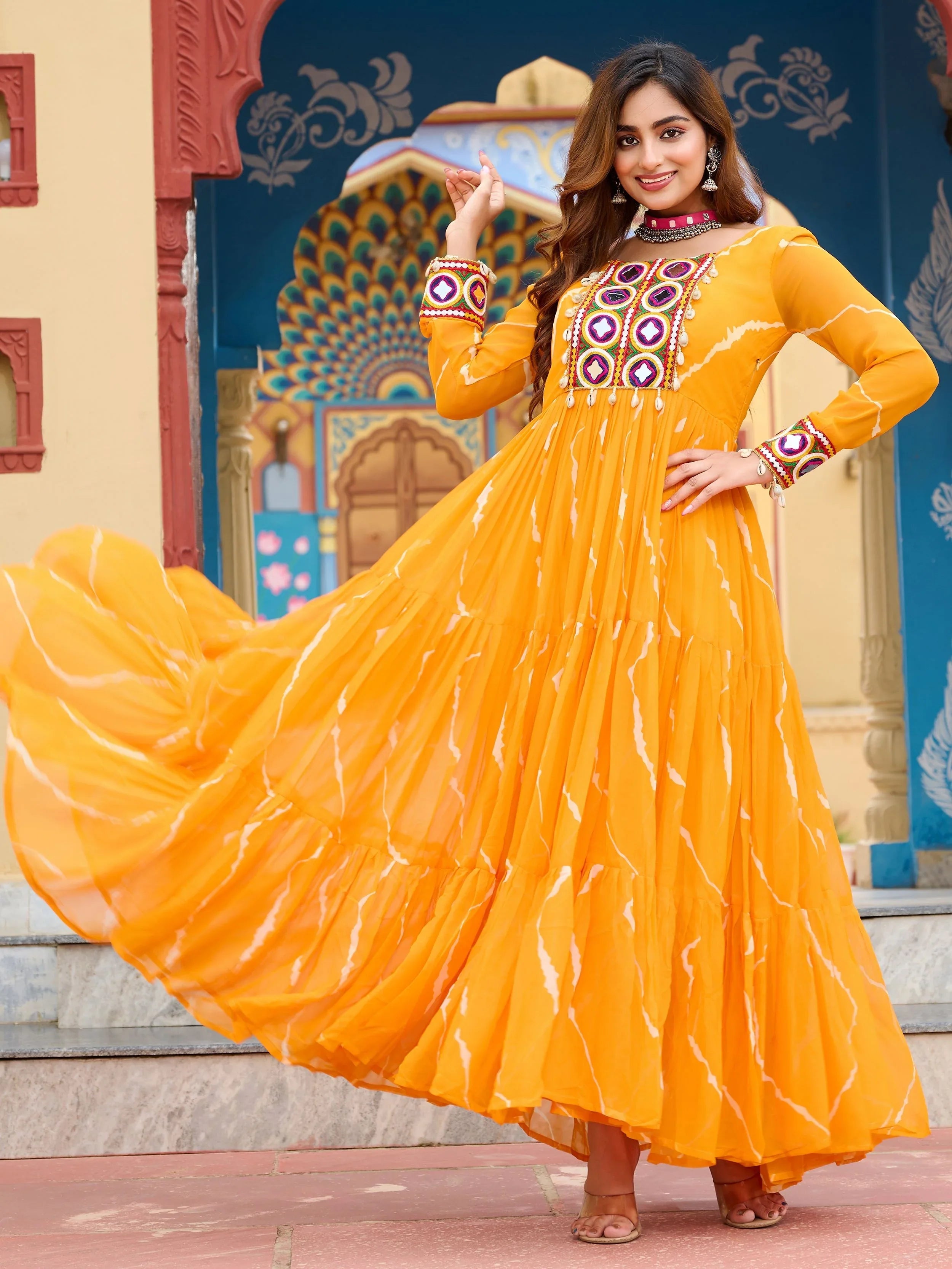 Yellow bandhani print georgette navratri gown with kutchi patchwork