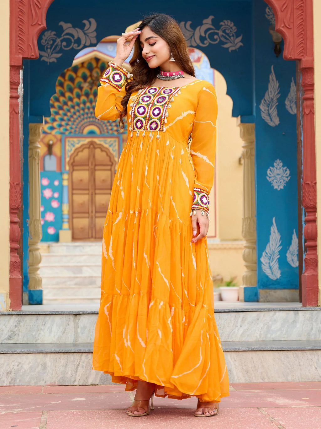 Yellow bandhani print georgette navratri gown with kutchi patchwork