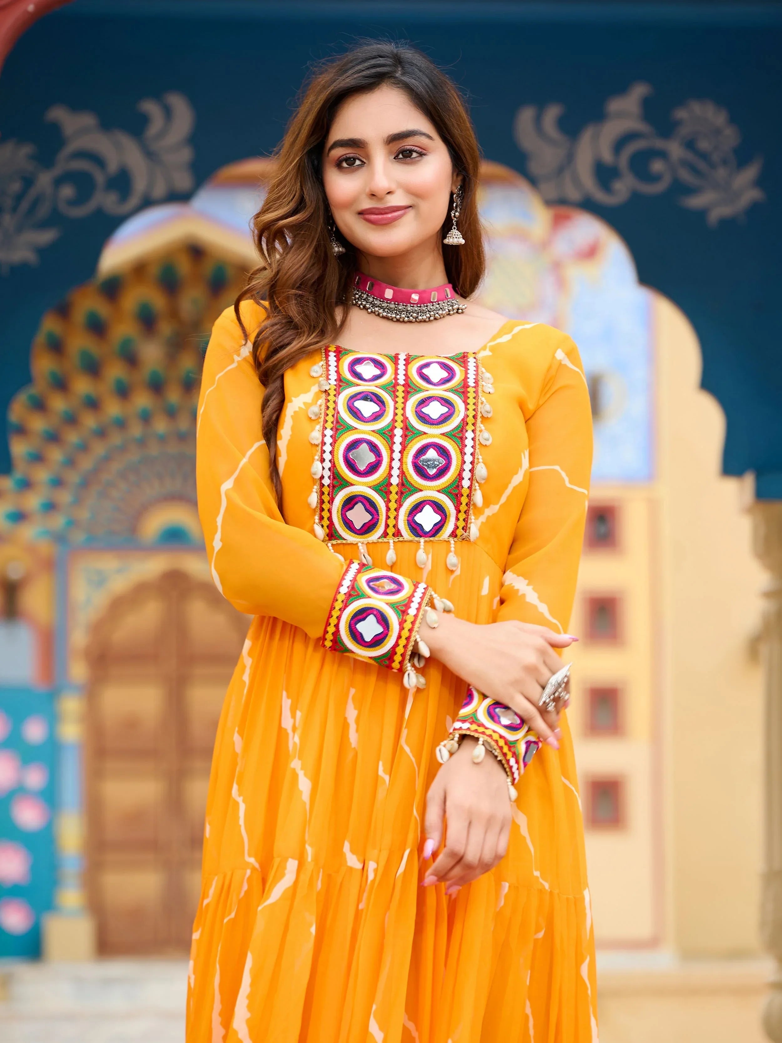 Yellow bandhani print georgette navratri gown with kutchi patchwork