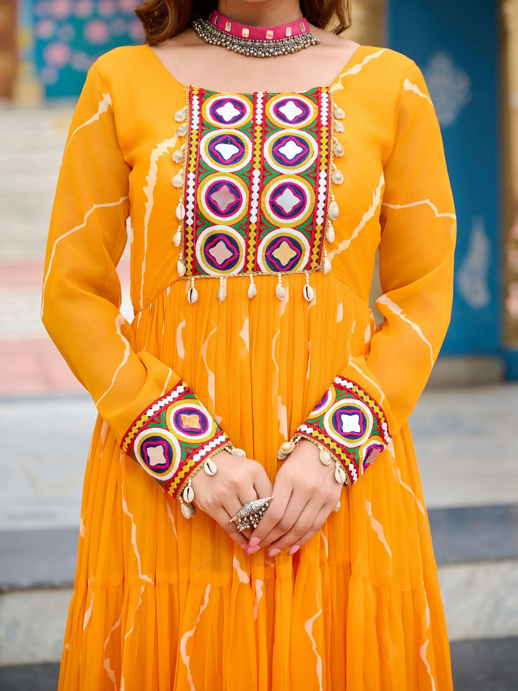 Yellow bandhani print georgette navratri gown with kutchi patchwork