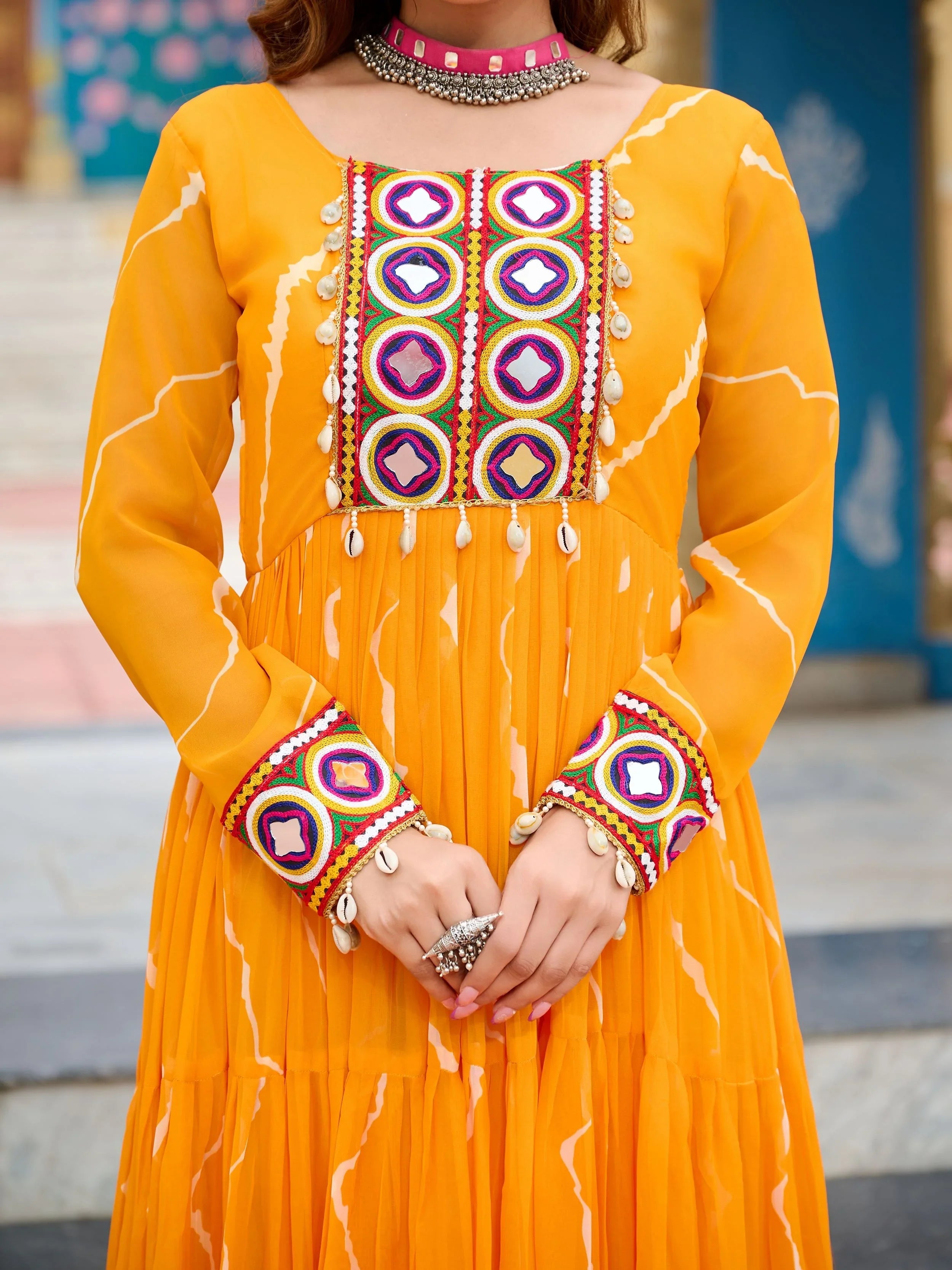 Yellow bandhani print georgette navratri gown with kutchi patchwork