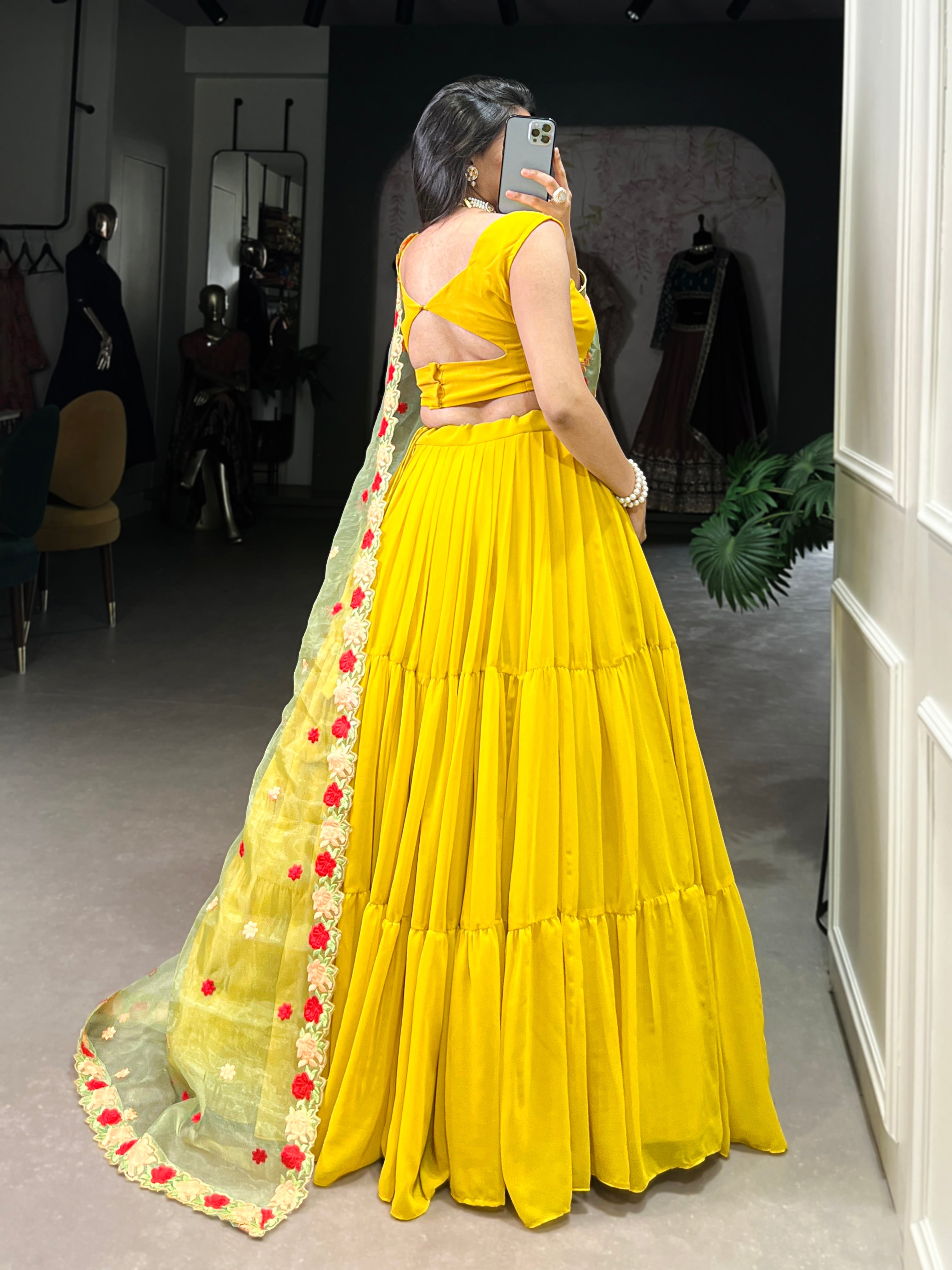 Yellow georgette plain lehenga choli with embroidered organza dupatta